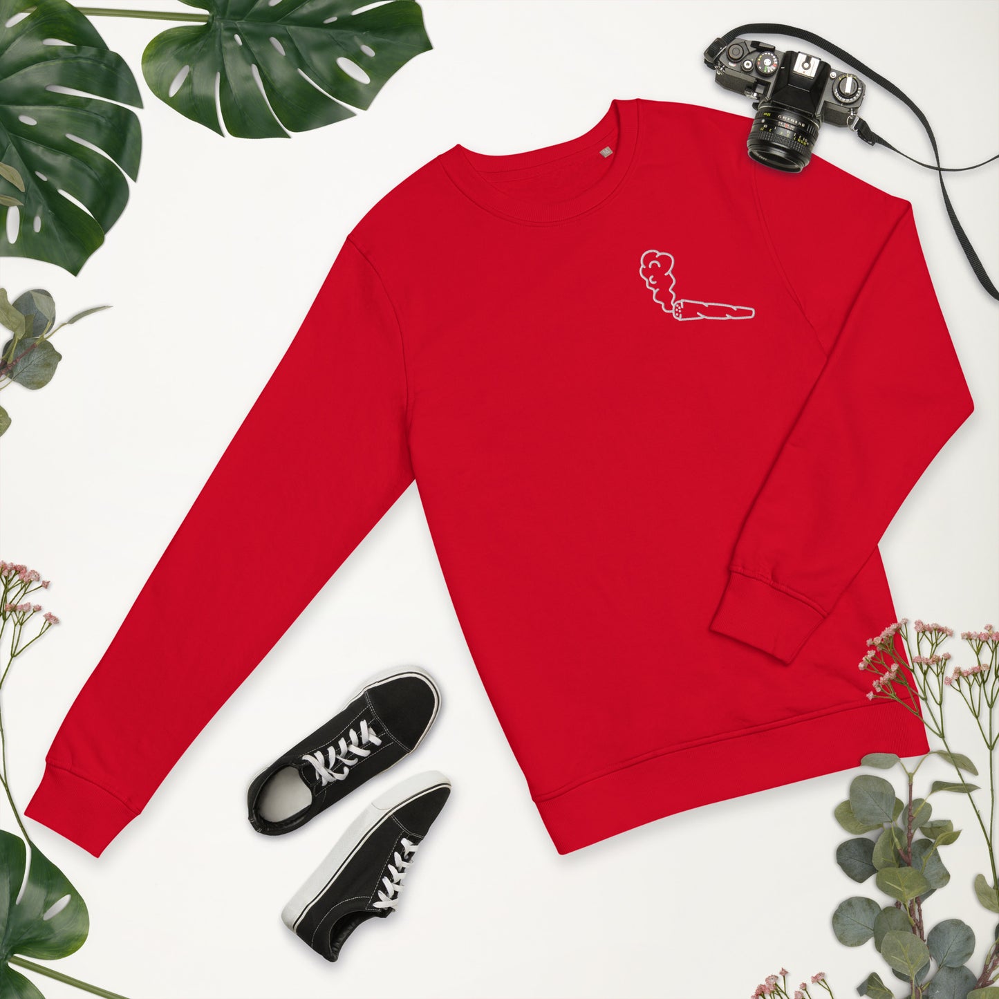 Image of the red Doobie Sweatshirt by CanEmpire. This sweatshirt is part of The Ultimate CanGame official merch and features an exclusive embroidered joint design on the heart. Made of organic cotton and recycled polyester, this soft sweatshirt is ideal for cannabis enthusiasts and is available for purchase at www.canempire.ca .