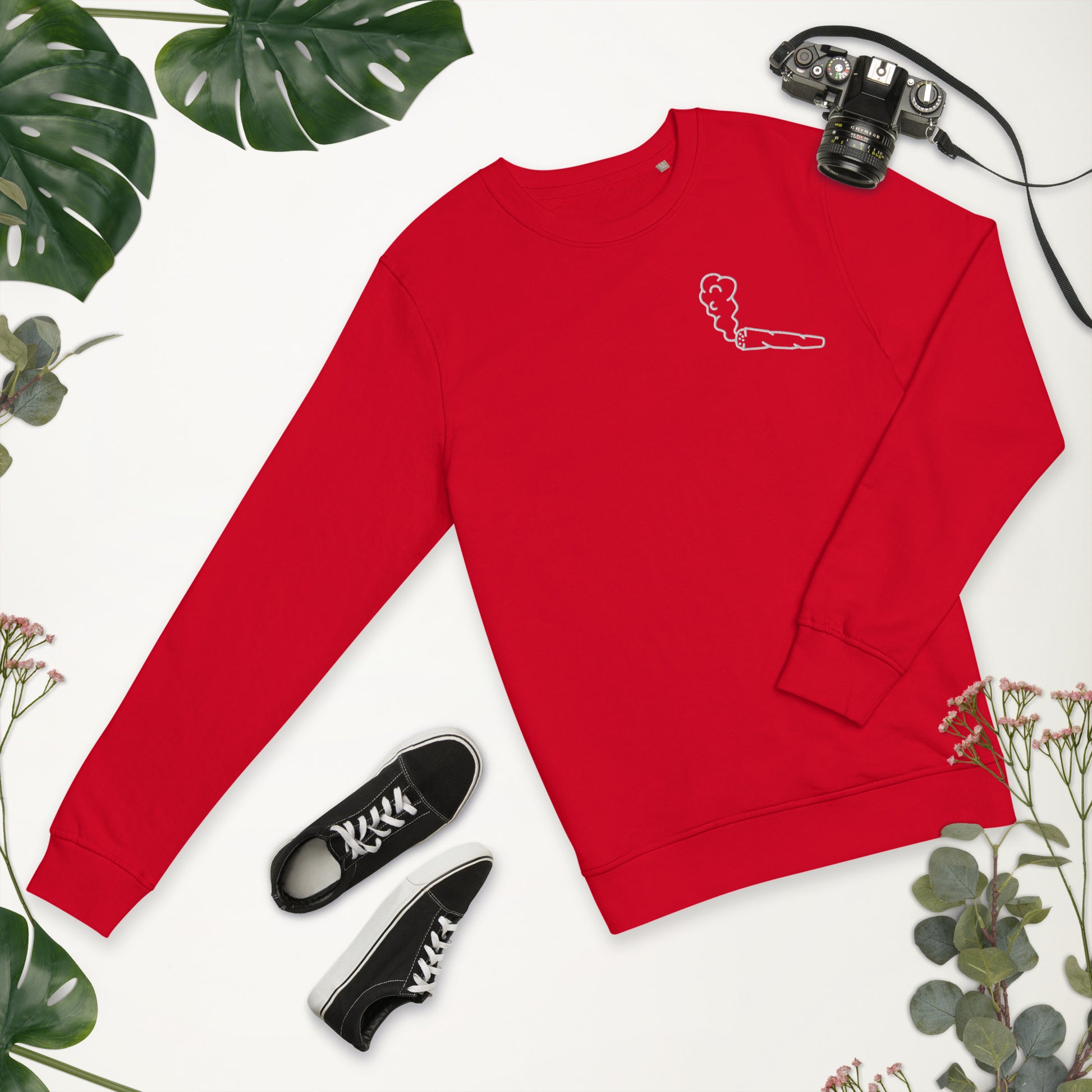 Image of the red Doobie Sweatshirt by CanEmpire. This sweatshirt is part of The Ultimate CanGame official merch and features an exclusive embroidered joint design on the heart. Made of organic cotton and recycled polyester, this soft sweatshirt is ideal for cannabis enthusiasts and is available for purchase at www.canempire.ca .