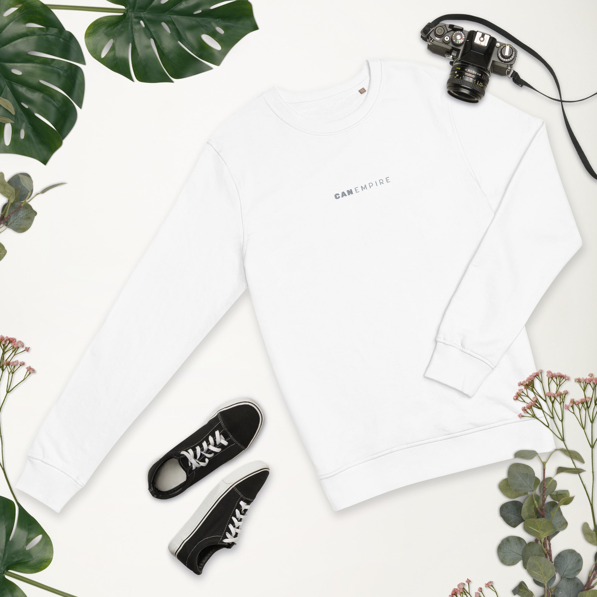 Image of the white sweatshirt from CanEmpire's official merch collection. This sweat features a small and classy logo of CanEmpire in the middle of the chest. Made of organic cotton and recycled polyester, this soft sweatshirt is ideal for cannabis enthusiasts and is available for purchase at www.canempire.ca .